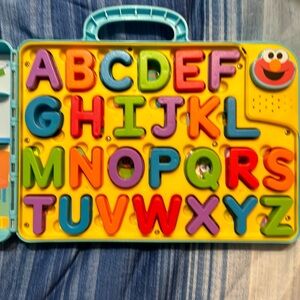 New. Elmo’s abc carry with you